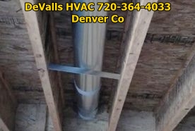 Showing 6 inch pipe with pipe hanger and angle boot in-between floor joist