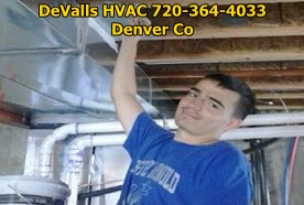 Showing a DeValls HVAC employee applying duct sealant